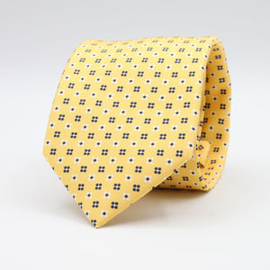 Cruciani &amp; Bella
100% Printed Silk

Self-Tipped
Yellow, White and Blue Motif Tie
Handmade in Rome, Italy.
8 cm x 150 cm
#9428