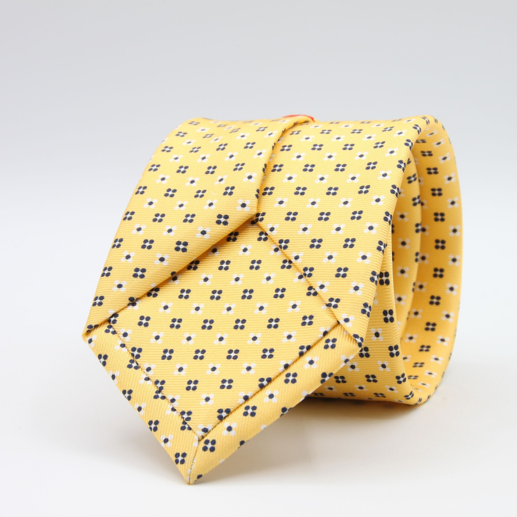 Cruciani &amp; Bella
100% Printed Silk

Self-Tipped
Yellow, White and Blue Motif Tie
Handmade in Rome, Italy.
8 cm x 150 cm
#9428