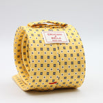 Cruciani &amp; Bella
100% Printed Silk

Self-Tipped
Yellow, White and Blue Motif Tie
Handmade in Rome, Italy.
8 cm x 150 cm
#9428