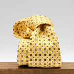 Cruciani &amp; Bella
100% Printed Silk

Self-Tipped
Yellow, White and Blue Motif Tie
Handmade in Rome, Italy.
8 cm x 150 cm
#9428