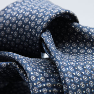 Cruciani &amp; Bella
100% Printed Silk

Self-Tipped
Blue, Grey and White Motif Tie&nbsp;
Handmade in Rome, Italy.

8 cm x 150 cm
#9284