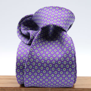 Cruciani &amp; Bella
100% Printed Silk

Self-Tipped
Violet, Off-White, Green and Light Blue Motif Tie&nbsp;
Handmade in Rome, Italy.

8 cm x 150 cm
#9285