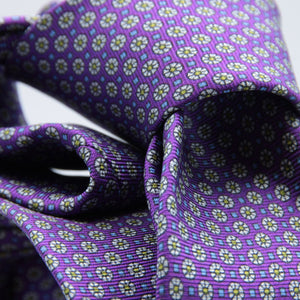 Cruciani &amp; Bella
100% Printed Silk

Self-Tipped
Violet, Off-White, Green and Light Blue Motif Tie&nbsp;
Handmade in Rome, Italy.

8 cm x 150 cm
#9285