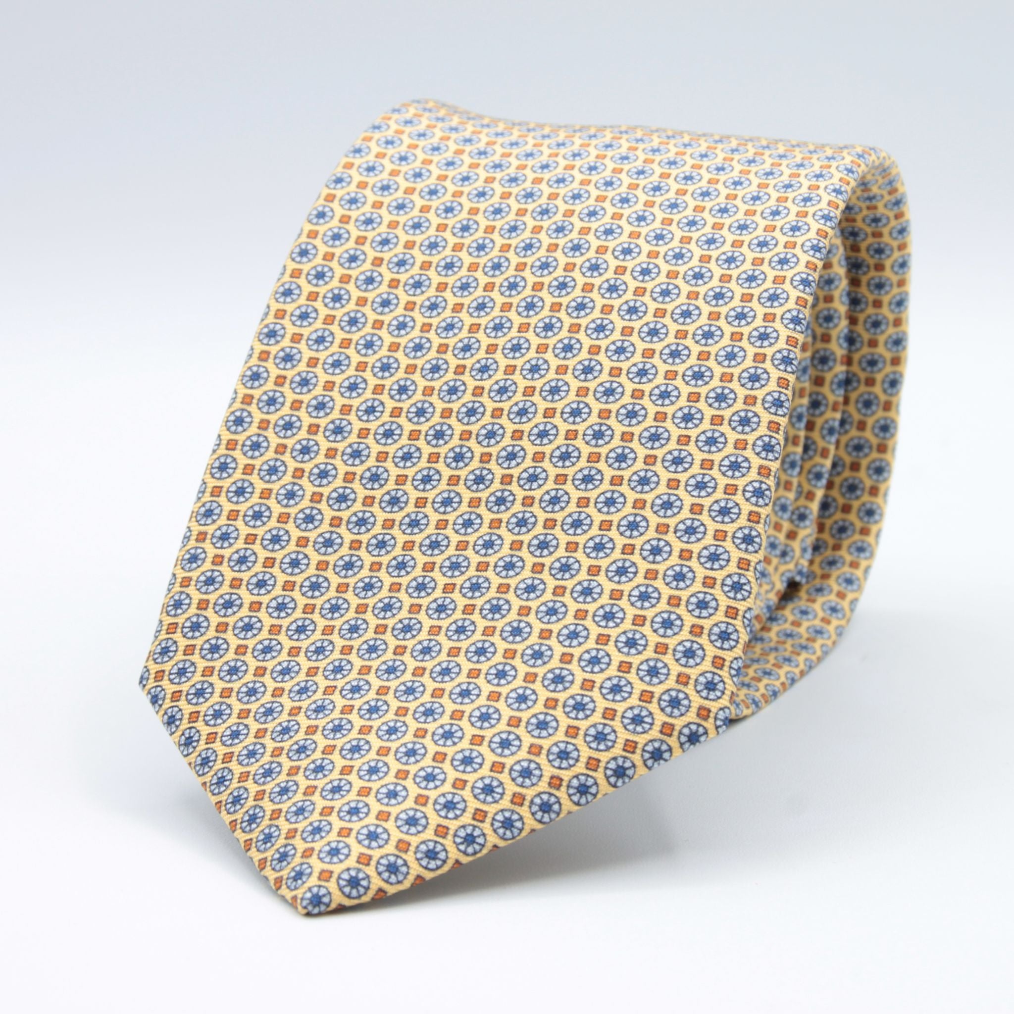 Cruciani &amp; Bella
100% Printed Silk

Self-Tipped
Yellow, Light Blue and Orange Motif Tie&nbsp;
Handmade in Rome, Italy.

8 cm x 150 cm
#9286