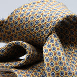 Cruciani &amp; Bella
100% Printed Silk

Self-Tipped
Yellow, Light Blue and Orange Motif Tie&nbsp;
Handmade in Rome, Italy.

8 cm x 150 cm
#9286