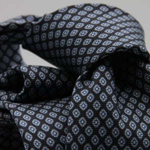 Cruciani &amp; Bella
100% Printed Silk

Self-Tipped
Dark Blue and Grey Motif Tie&nbsp;
Handmade in Rome, Italy.

8 cm x 150 cm
#9290