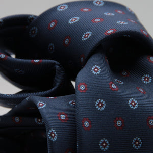 Cruciani &amp; Bella
100% Printed Silk

Self-Tipped
Blue, Red and Light Blue Motif Tie&nbsp;
Handmade in Rome, Italy.

8 cm x 150 cm
#9299
