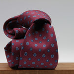 Cruciani &amp; Bella
100% Printed Silk

Self-Tipped
Red Wine, Blue, Light Blue and White Motif Tie&nbsp;
Handmade in Rome, Italy.

8 cm x 150 cm
#9300