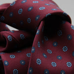 Cruciani &amp; Bella
100% Printed Silk

Self-Tipped
Red Wine, Blue, Light Blue and White Motif Tie&nbsp;
Handmade in Rome, Italy.

8 cm x 150 cm
#9300