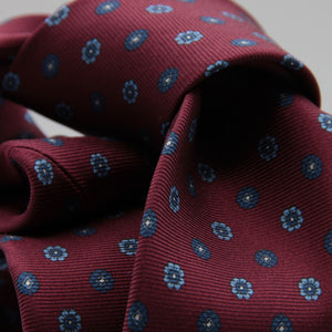 Cruciani &amp; Bella
100% Printed Silk

Self-Tipped
Red Wine, Blue, Light Blue and White Motif Tie&nbsp;
Handmade in Rome, Italy.

8 cm x 150 cm
#9300
