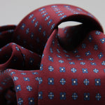 Cruciani &amp; Bella
100% Printed Silk

Self-Tipped
Red Wine, Blue, Light Blue and White Motif Tie&nbsp;
Handmade in Rome, Italy.

8 cm x 150 cm
#9304