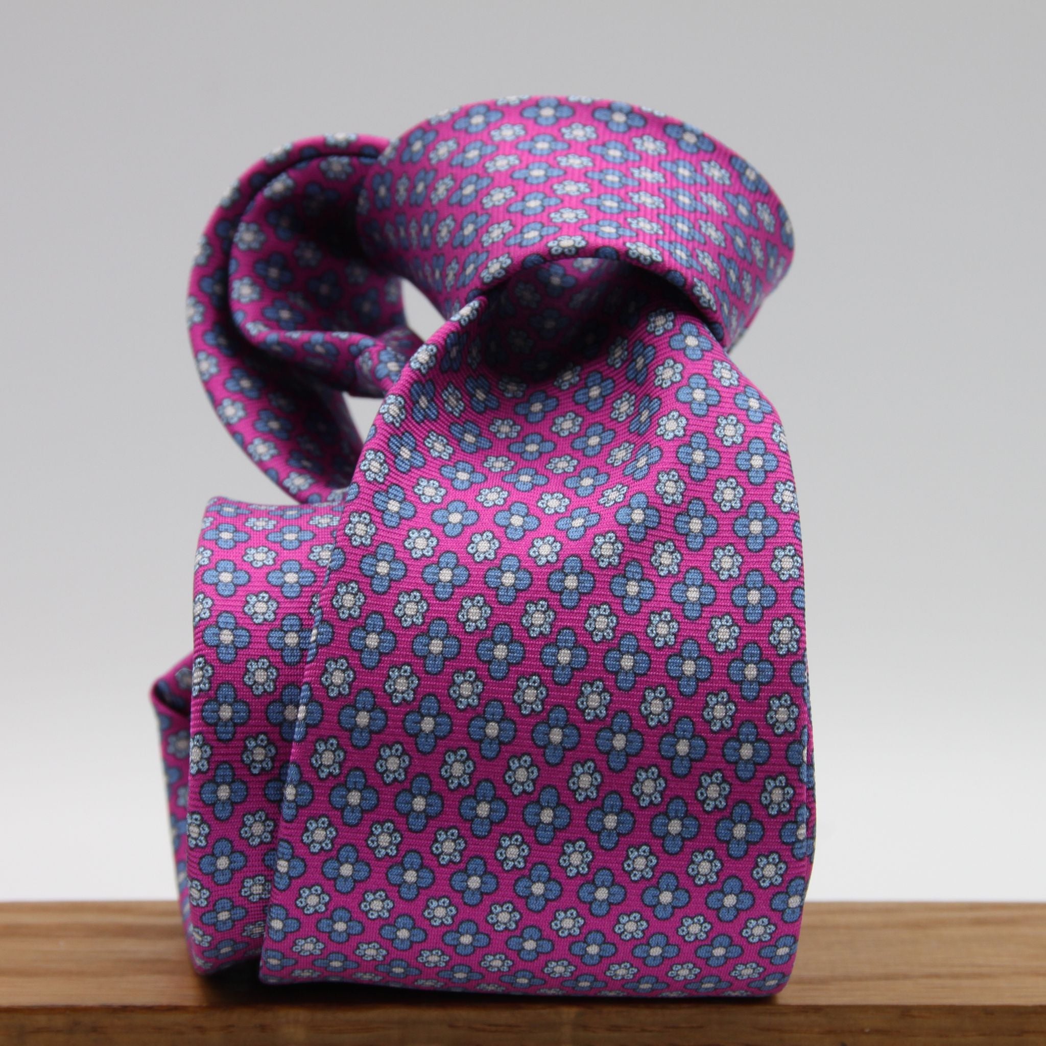 Cruciani &amp; Bella
100% Printed Silk

Self-Tipped
Fucsia, Blue, Light Blue and White Motif Tie&nbsp;
Handmade in Rome, Italy.

8 cm x 150 cm
#9306