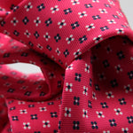 Cruciani &amp; Bella
100% Printed Silk

Self-Tipped
Fucsia, White and Blue Motif Tie
Handmade in Rome, Italy.
8 cm x 150 cm
#9427