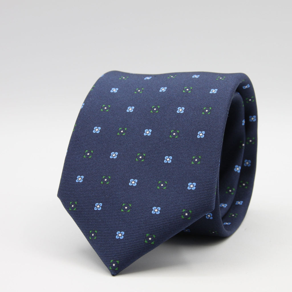 Cruciani &amp; Bella
100% Printed Silk

Self-Tipped
Royal Blue, Green and Light Blue Motif Tie
Handmade in Rome, Italy.
8 cm x 150 cm
#9431