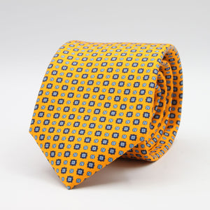 Cruciani &amp; Bella
100% Printed Silk

Self-Tipped
Light Orange, Royal Blue and Light Blue Motif Tie
Handmade in Rome, Italy.
8 cm x 150 cm
#9432