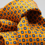Cruciani &amp; Bella
100% Printed Silk

Self-Tipped
Light Orange, Royal Blue and Light Blue Motif Tie
Handmade in Rome, Italy.
8 cm x 150 cm
#9432