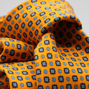 Cruciani &amp; Bella
100% Printed Silk

Self-Tipped
Light Orange, Royal Blue and Light Blue Motif Tie
Handmade in Rome, Italy.
8 cm x 150 cm
#9432