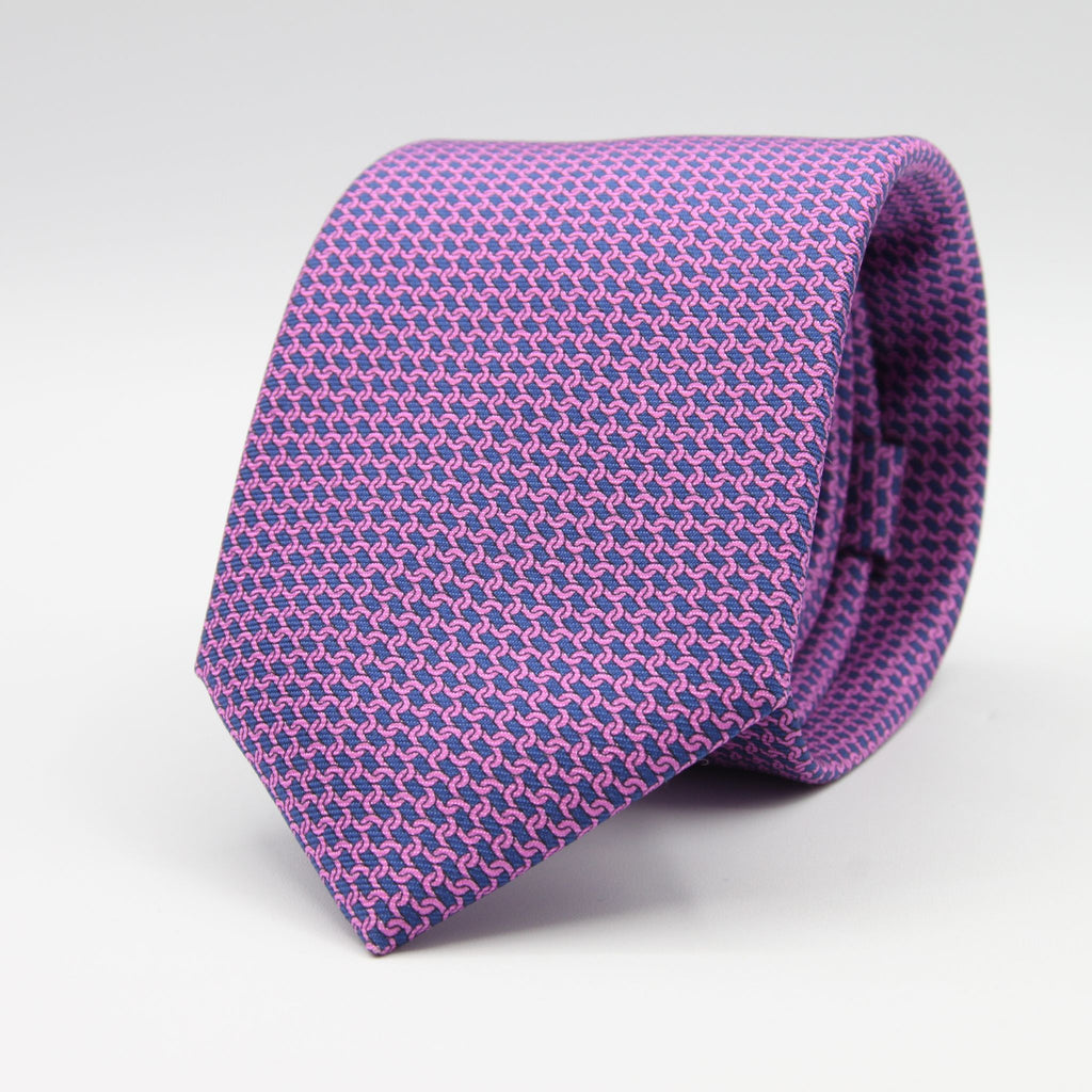 Cruciani &amp; Bella
100% Silk
Printed
Self-Tipped
Blue and Fucsia Motif Tie
Handmade in Rome, Italy.
8 cm x 150 cm
#9433