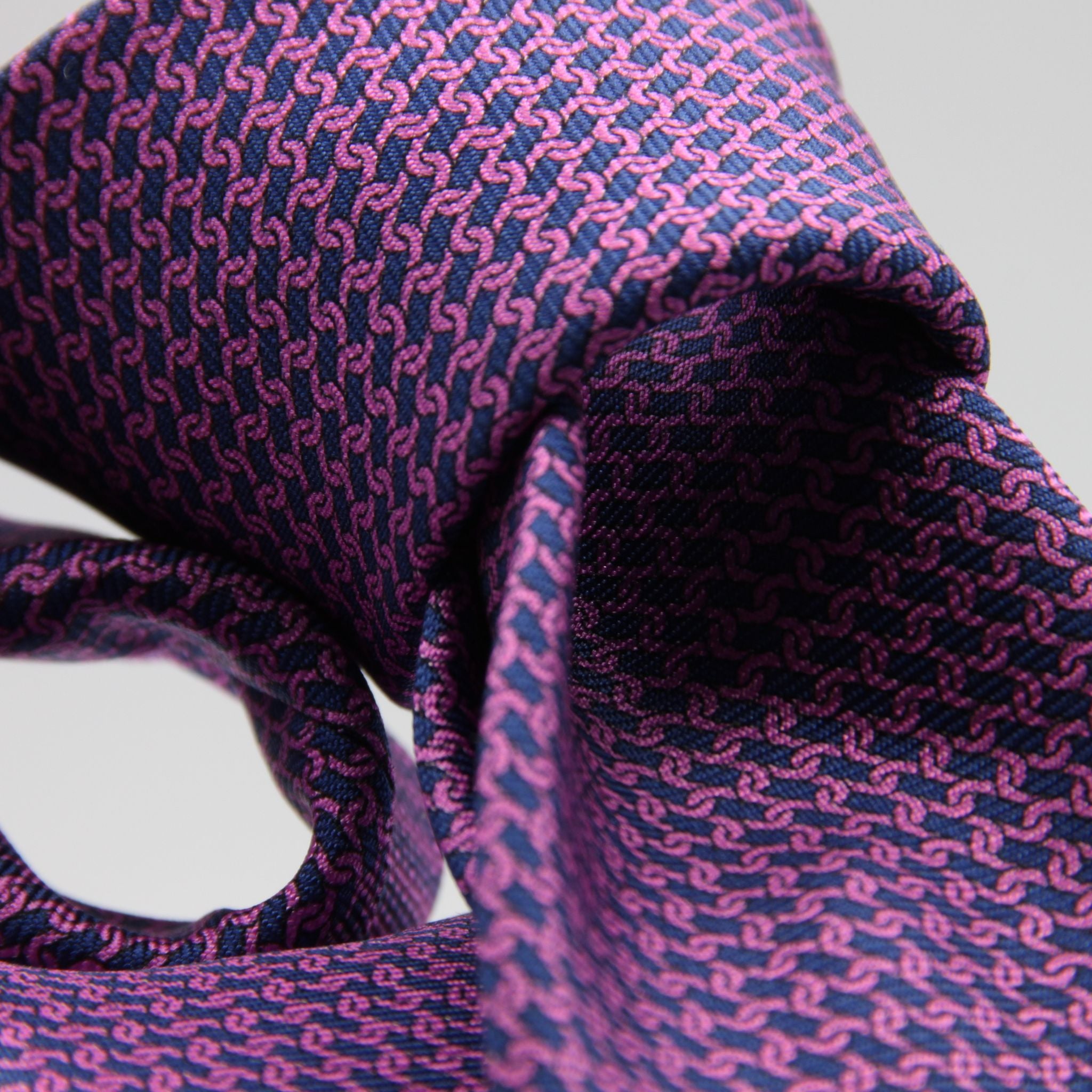 Cruciani &amp; Bella
100% Silk
Printed
Self-Tipped
Blue and Fucsia Motif Tie
Handmade in Rome, Italy.
8 cm x 150 cm
#9433