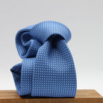 Cruciani &amp; Bella
100% Silk
Printed
Self-Tipped
Blue and Light Blue Motif Tie
Handmade in Rome, Italy.
8 cm x 150 cm
#9434