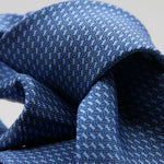 Cruciani &amp; Bella
100% Silk
Printed
Self-Tipped
Blue and Light Blue Motif Tie
Handmade in Rome, Italy.
8 cm x 150 cm
#9434