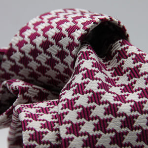 Cruciani &amp; Bella

100% Woven Jacquard silk
Tipped

Fuchsia Houndstooth Tie
Handmade in Como, Italy
8 cm x 150 cm
#7723