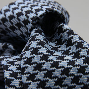 Cruciani &amp; Bella

100% Woven Jacquard silk
Tipped

Blue Navy and Baby Blue Pied de Poule &nbsp;Motif Tie
Handmade in Como, Italy
8 cm x 150 cm
#8803