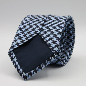 Cruciani &amp; Bella

100% Woven Jacquard silk
Tipped

Blue Navy and Baby Blue Pied de Poule &nbsp;Motif Tie
Handmade in Como, Italy
8 cm x 150 cm
#8803