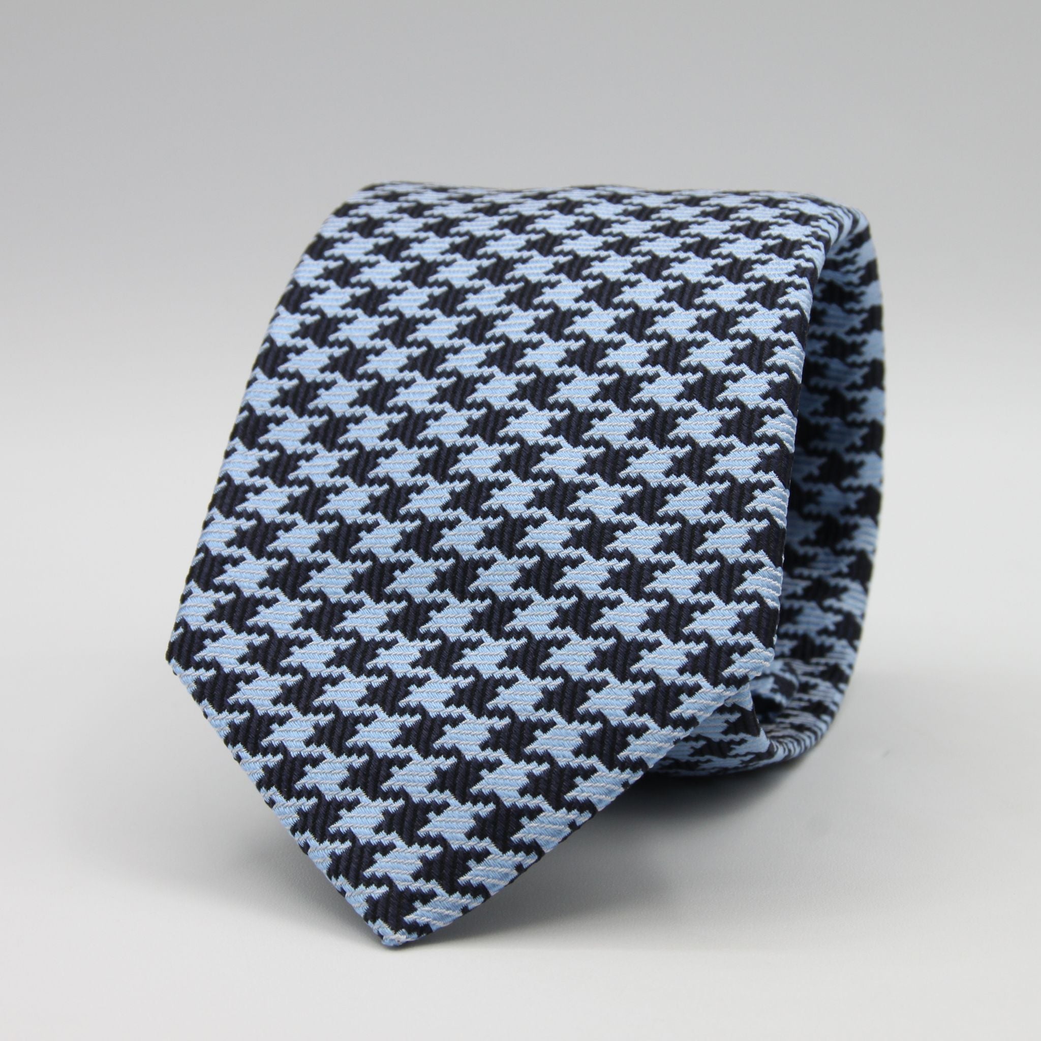 Cruciani &amp; Bella

100% Woven Jacquard silk
Tipped

Blue Navy and Baby Blue Pied de Poule &nbsp;Motif Tie
Handmade in Como, Italy
8 cm x 150 cm
#8803