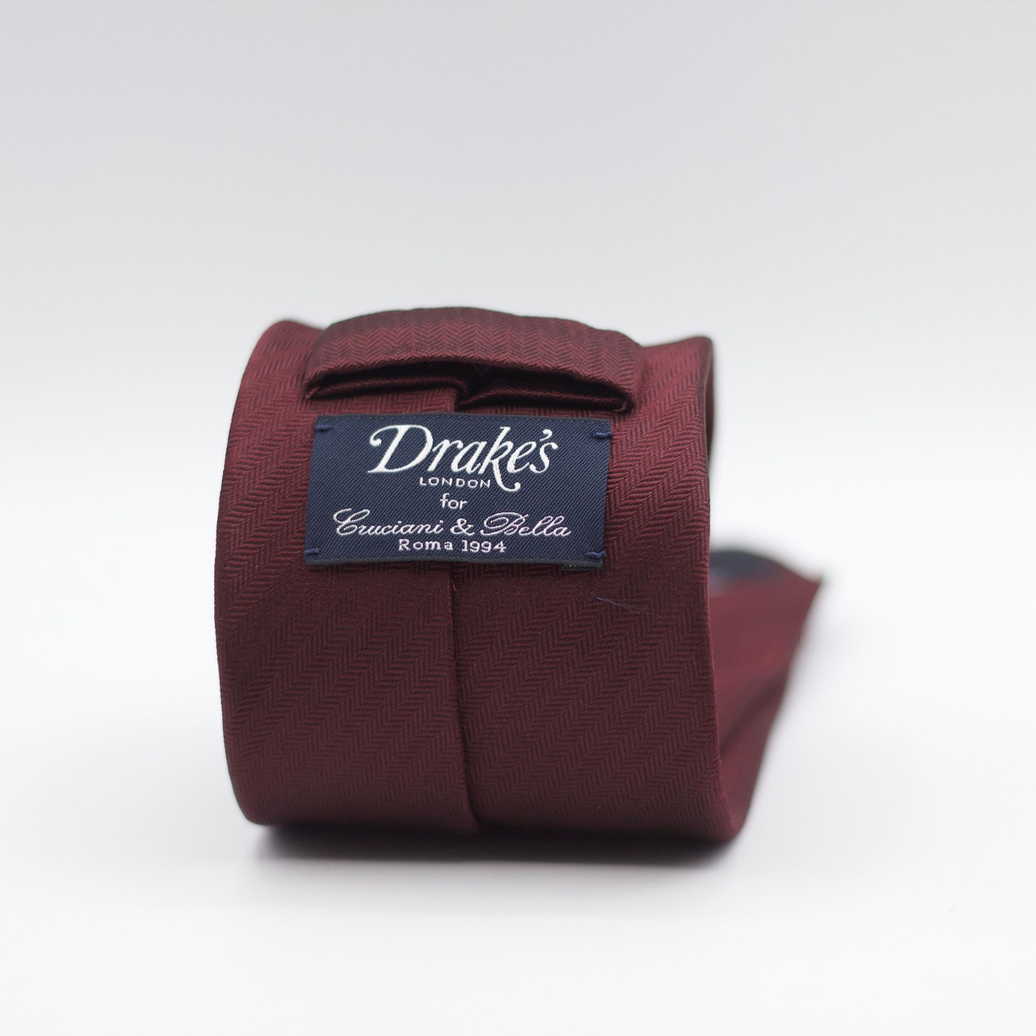 Drake's for Cruciani e Bella 100%&nbsp; Woven jacquard Silk Tipped Red Wine Heringbone Tie Handmade in London, England