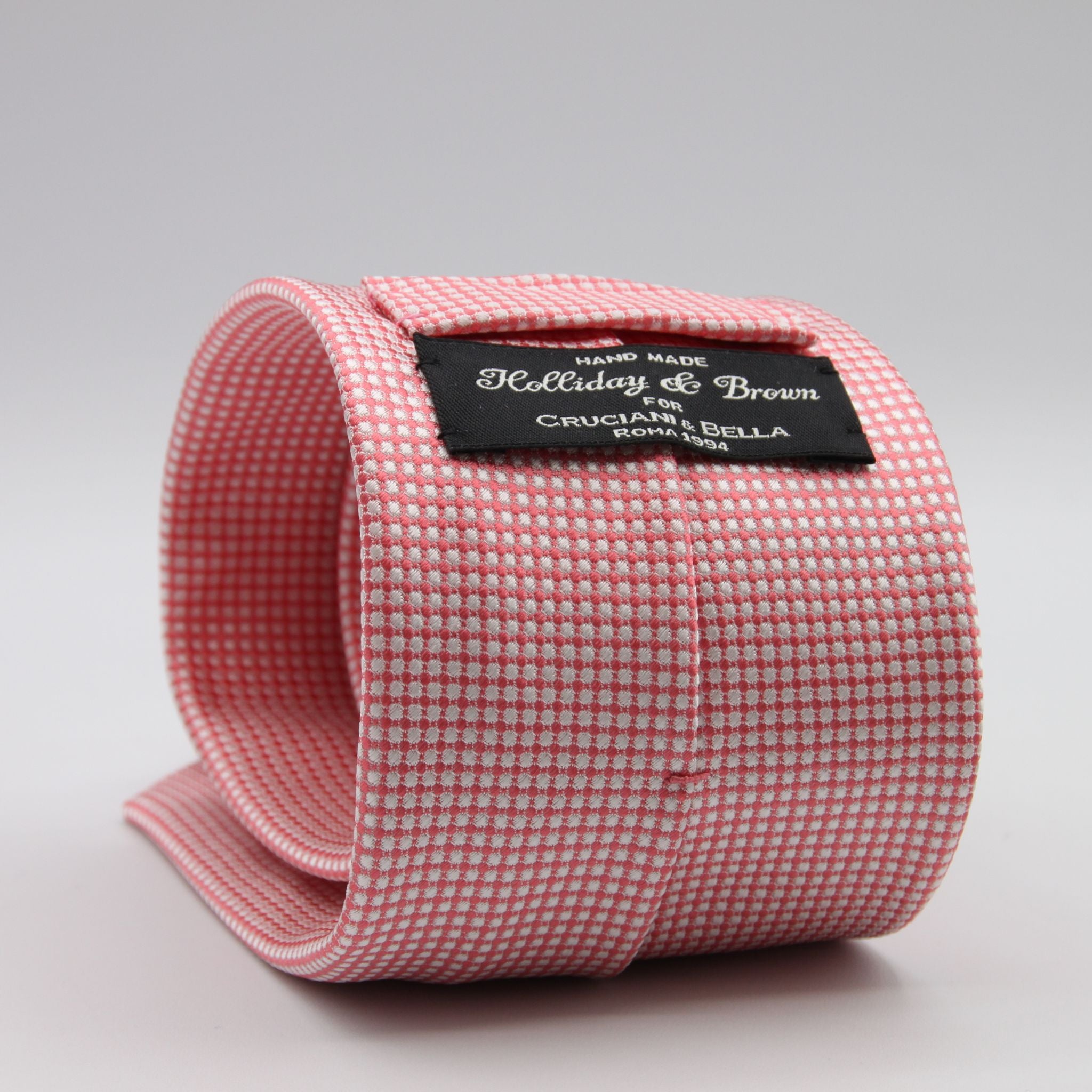 Holliday &amp; Brown for Cruciani &amp; Bella
100%&nbsp;Woven Jacquard Silk
Tipped

Pink and White color motif tie
Handmade in Italy

8 cm x 150 cm
#9345