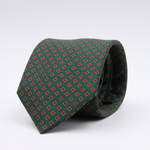 Holliday &amp; Brown for Cruciani &amp; Bella
100% printed Silk
Self Tipped
Green, Orange, Brown and Red motif tie
Exclusive tie lining
Handmade in Italy
8,5 cm x 150 cm
#10402
