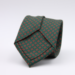 Holliday &amp; Brown for Cruciani &amp; Bella
100% printed Silk
Self Tipped
Green, Orange, Brown and Red motif tie
Exclusive tie lining
Handmade in Italy
8,5 cm x 150 cm
#10402