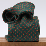 Holliday &amp; Brown for Cruciani &amp; Bella
100% printed Silk
Self Tipped
Green, Orange, Brown and Red motif tie
Exclusive tie lining
Handmade in Italy
8,5 cm x 150 cm
#10402