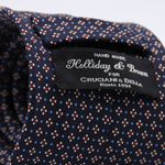 Holliday &amp; Brown for Cruciani &amp; Bella
100% printed Silk
Self Tipped
Navy Blue, Yellow, Light Blue and Red motif tie
Exclusive tie lining
Handmade in Italy
8,5 cm x 150 cm
#10416