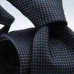 Holliday &amp; Brown for Cruciani &amp; Bella
100%&nbsp;Woven Jacquard Silk
Tipped

Grey, Dark Blue and Black motif tie
Handmade in Italy

8 cm x 150 cm
#8968