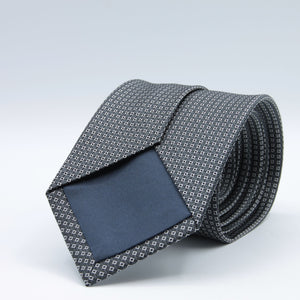 Holliday &amp; Brown for Cruciani &amp; Bella
100%&nbsp;Woven Jacquard Silk
Tipped

Dark Blue and White motif tie
Handmade in Italy

8 cm x 150 cm
#8981