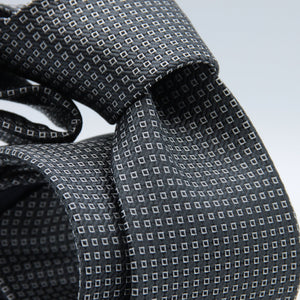 Holliday &amp; Brown for Cruciani &amp; Bella
100%&nbsp;Woven Jacquard Silk
Tipped

Dark Blue and White motif tie
Handmade in Italy

8 cm x 150 cm
#8981