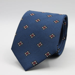 Holliday &amp; Brown for Cruciani &amp; Bella
100%&nbsp;Woven Jacquard Silk
Tipped

Blue, White and Red color motif tie
Handmade in Italy

8 cm x 150 cm
#9339