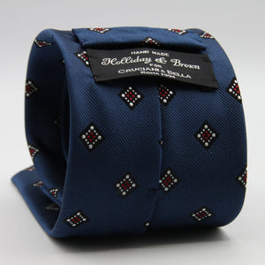 Holliday &amp; Brown for Cruciani &amp; Bella
100%&nbsp;Woven Jacquard Silk
Tipped

Blue, White and Red color motif tie
Handmade in Italy

8 cm x 150 cm
#9339