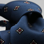 Holliday &amp; Brown for Cruciani &amp; Bella
100%&nbsp;Woven Jacquard Silk
Tipped

Blue, White and Red color motif tie
Handmade in Italy

8 cm x 150 cm
#9339