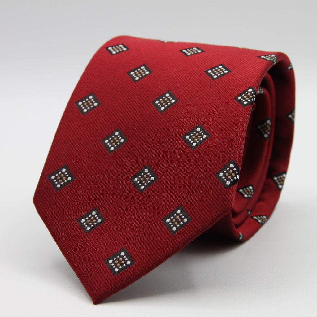 Holliday &amp; Brown for Cruciani &amp; Bella
100%&nbsp;Woven Jacquard Silk
Tipped

Red, White and Beige color motif tie
Handmade in Italy

8 cm x 150 cm
#9340