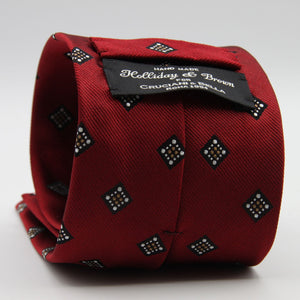 Holliday &amp; Brown for Cruciani &amp; Bella
100%&nbsp;Woven Jacquard Silk
Tipped

Red, White and Beige color motif tie
Handmade in Italy

8 cm x 150 cm
#9340
