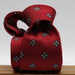 Holliday &amp; Brown for Cruciani &amp; Bella
100%&nbsp;Woven Jacquard Silk
Tipped

Red, White and Beige color motif tie
Handmade in Italy

8 cm x 150 cm
#9340