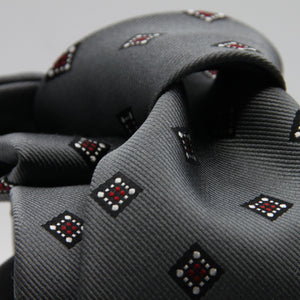 Holliday &amp; Brown for Cruciani &amp; Bella
100%&nbsp;Woven Jacquard Silk
Tipped

Grey, White and Red color motif tie
Handmade in Italy

8 cm x 150 cm
#9342