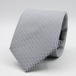 Holliday &amp; Brown for Cruciani &amp; Bella
100%&nbsp;Woven Jacquard Silk
Tipped

Dark Blue and White color motif tie
Handmade in Italy

8 cm x 150 cm
#9346