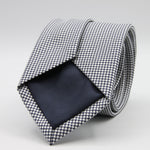 Holliday &amp; Brown for Cruciani &amp; Bella
100%&nbsp;Woven Jacquard Silk
Tipped

Dark Blue and White color motif tie
Handmade in Italy

8 cm x 150 cm
#9346