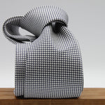 Holliday &amp; Brown for Cruciani &amp; Bella
100%&nbsp;Woven Jacquard Silk
Tipped

Dark Blue and White color motif tie
Handmade in Italy

8 cm x 150 cm
#9346