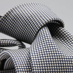 Holliday &amp; Brown for Cruciani &amp; Bella
100%&nbsp;Woven Jacquard Silk
Tipped

Dark Blue and White color motif tie
Handmade in Italy

8 cm x 150 cm
#9346