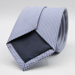 Holliday &amp; Brown for Cruciani &amp; Bella
100%&nbsp;Woven Jacquard Silk
Tipped
Royal Blue and White color motif tie
Handmade in Italy

8 cm x 150 cm
#9347